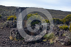 Stone marker at the Cratere Commerson in Reunion island photo